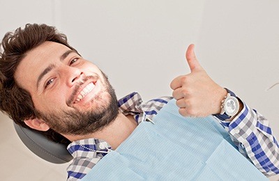 man smiling thumb up